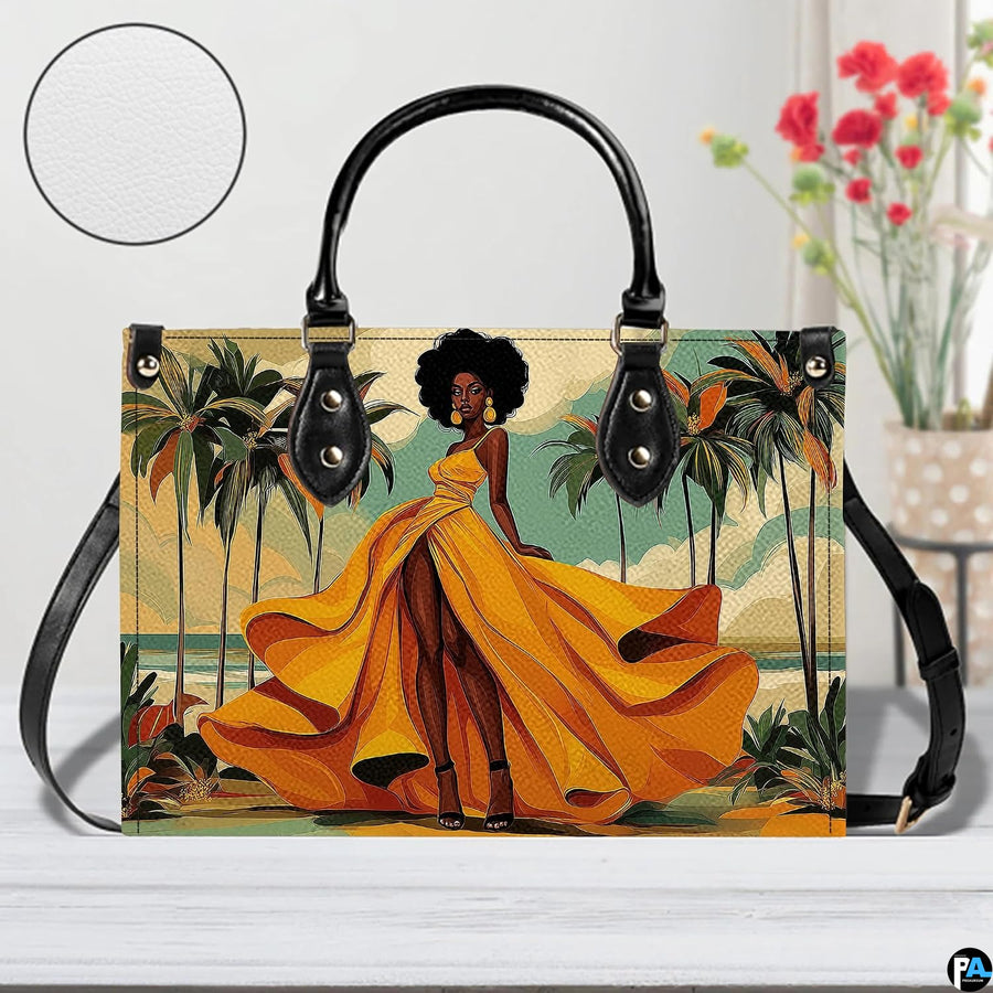Seaside yellow gown fashion accessory displayed on a white wooden tabletop beside decorative red blossoms.