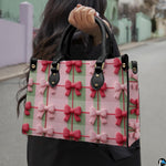 Street lifestyle view of pink and sage gingham check item with ribbon bows held in hand