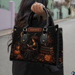 Outdoor lifestyle perspective showcasing witchy halloween art accessory held against paved street environment.