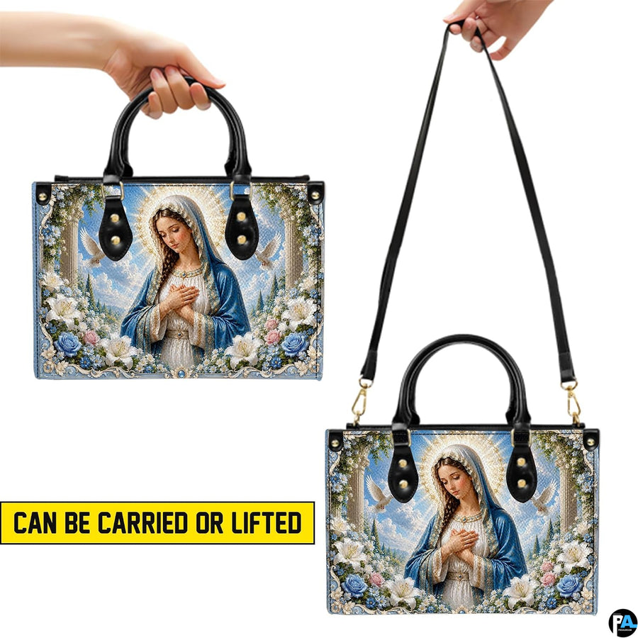 Lifestyle display of white doves Madonna handbag carried by model showing artwork and scale