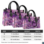 Top-down view of purple floral butterfly cross handbag showing dual carrying handles.
