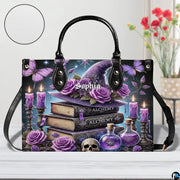 Gothic handbag beside floral vase with circular texture detail showing surface grain.