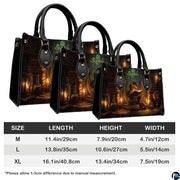 Lifestyle presentation of candlelit dragon handbag and wallet set with styling accessories