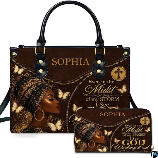 Brown leopard headwrap portrait handbag with gold butterflies and cross medallion beside matching wallet