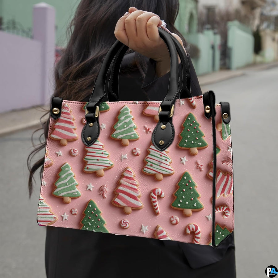 Model holding item outdoors featuring festive decorated holiday tree cookies pattern.