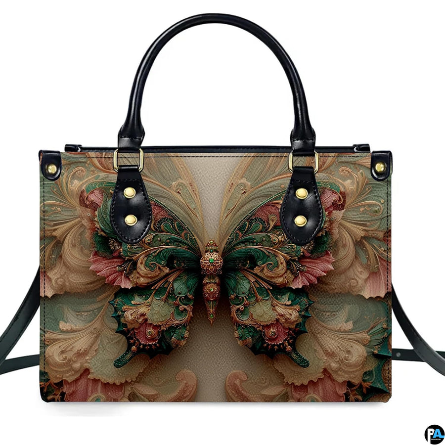 Straight-on studio portrait of emerald Rococo butterfly handbag against white background