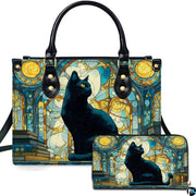 Studio presentation of cat on books stained glass artwork alongside matching companion accessory.