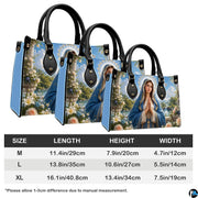 Detailed view of matching wallet featuring Virgin Mary on scenic marble terrace