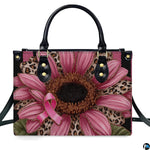 Studio perspective displaying front view of pink sunflower art accessory showcasing leopard petals.