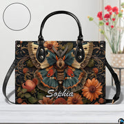 Close-up front view of matching vintage moth zippered wallet