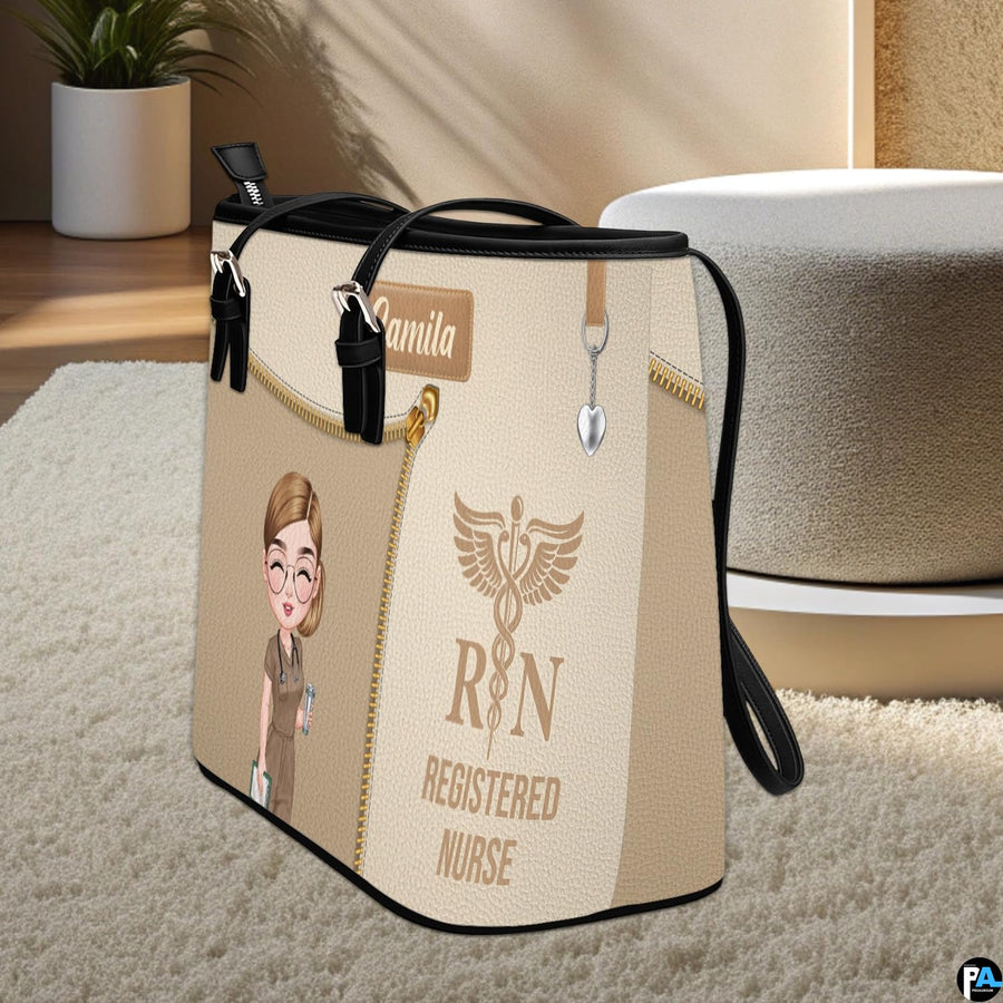 Upright display of Beige Clinician Tote Handbag standing on a light carpeted floor.