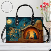 Alternative angle view showing Bethlehem nativity handbag and wallet matching pair