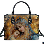 Centered front view of bejeweled Madonna and sleeping child Jesus devotional art handbag