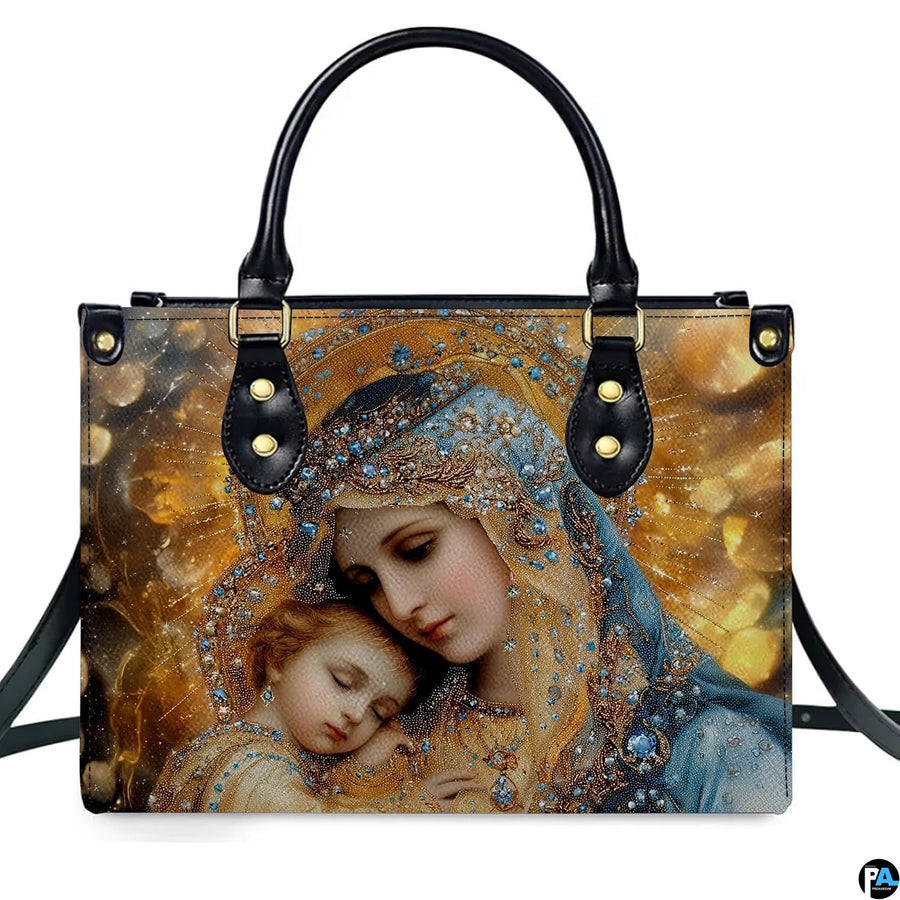 Centered front view of bejeweled Madonna and sleeping child Jesus devotional art handbag