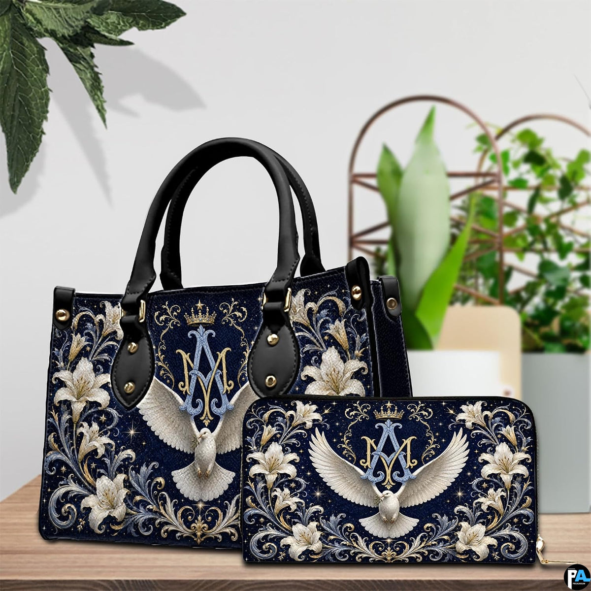 Side profile view of structured Marian crest handbag showing silhouette and black carry handles