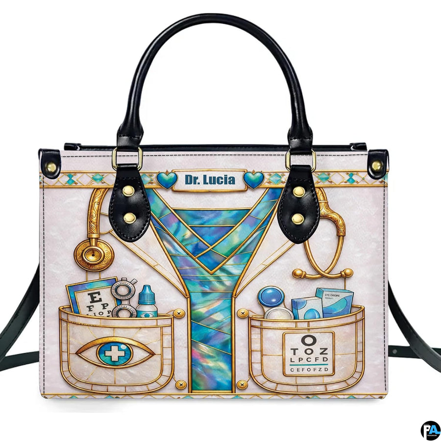 Front view of optometrist handbag featuring vision charts, optical instruments, and coat artwork