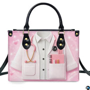 Front view of pink doctor handbag featuring white lab coat, stethoscope, and spiral notebook artwork