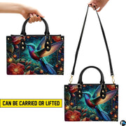 Front view of matching wallet carrying coordinating luminous hummingbird and twilight garden art.