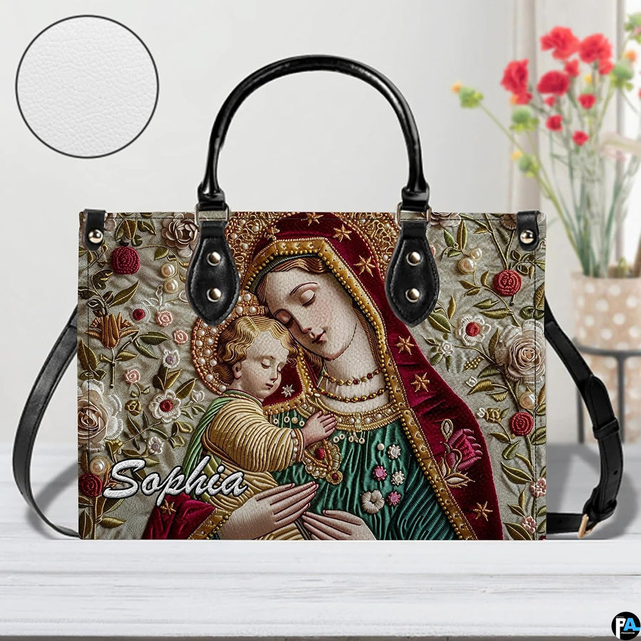 Madonna and Child sacred tapestry handbag displayed with round texture detail inset