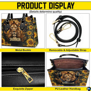 Top-down view of lion sunflower cross handbag showing dual carrying handles.