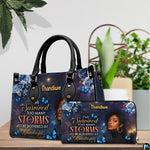 Tabletop presentation highlighting celestial woman painting resting beside leafy indoor greenery.