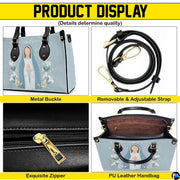 Product display showing zipper, buckle hardware, interior lining, and strap of handbag
