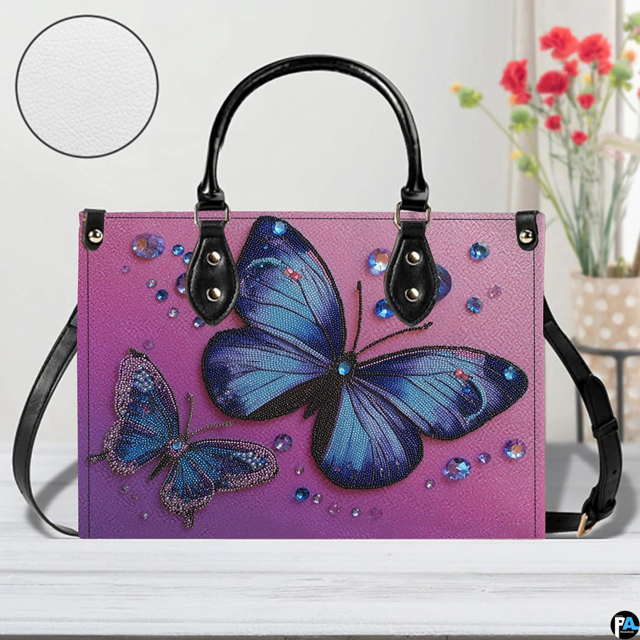 Interior compartment view of butterfly handbag showing inner lining and organization.