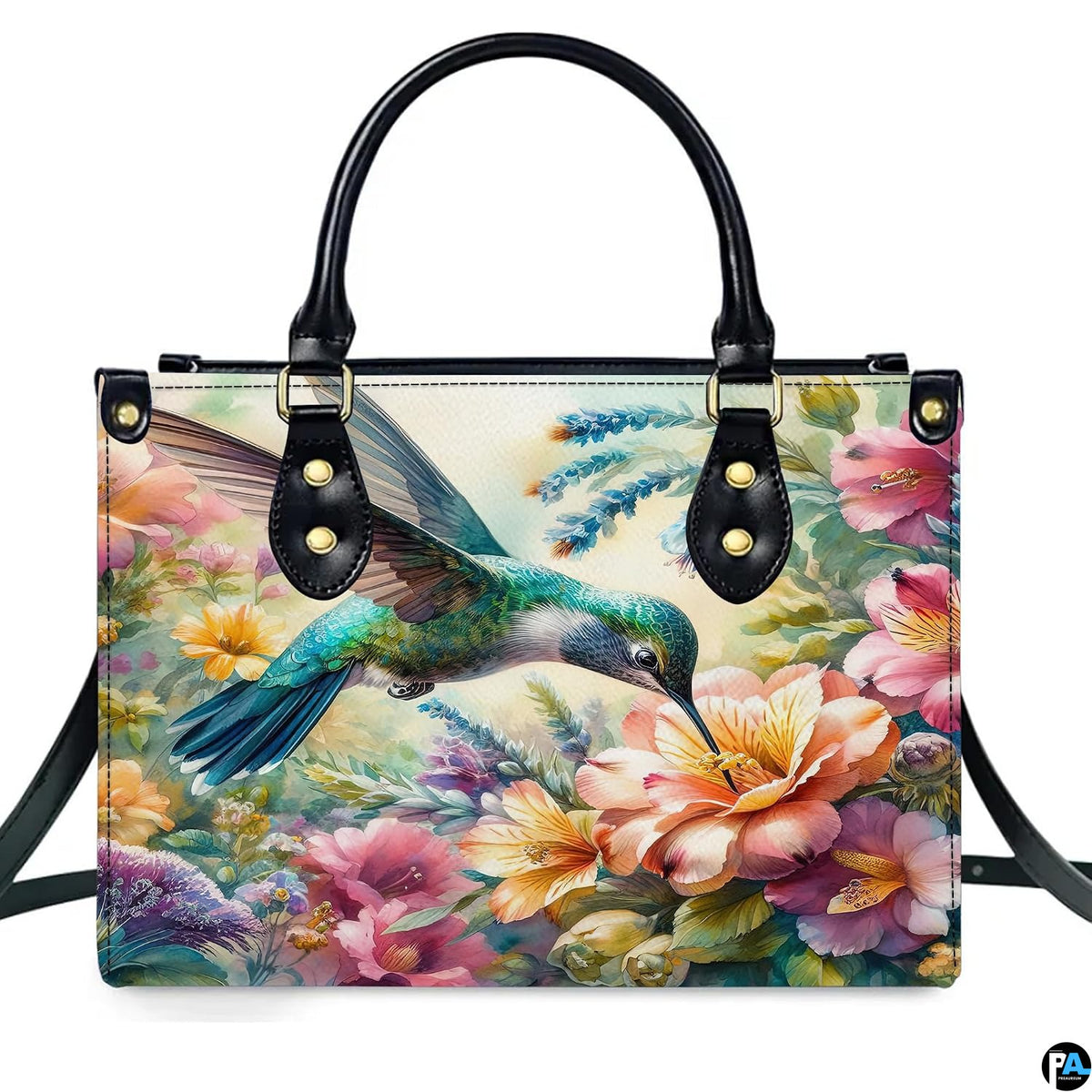 Complete set presentation of watercolor hummingbird handbag and matching wallet on neutral backdrop.