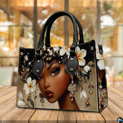 Afrocentric portrait artwork with white plumeria floral details showcased in a warm interior café setting.