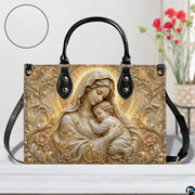Sculpted Madonna and Child handbag displayed with circular texture zoom detail inset
