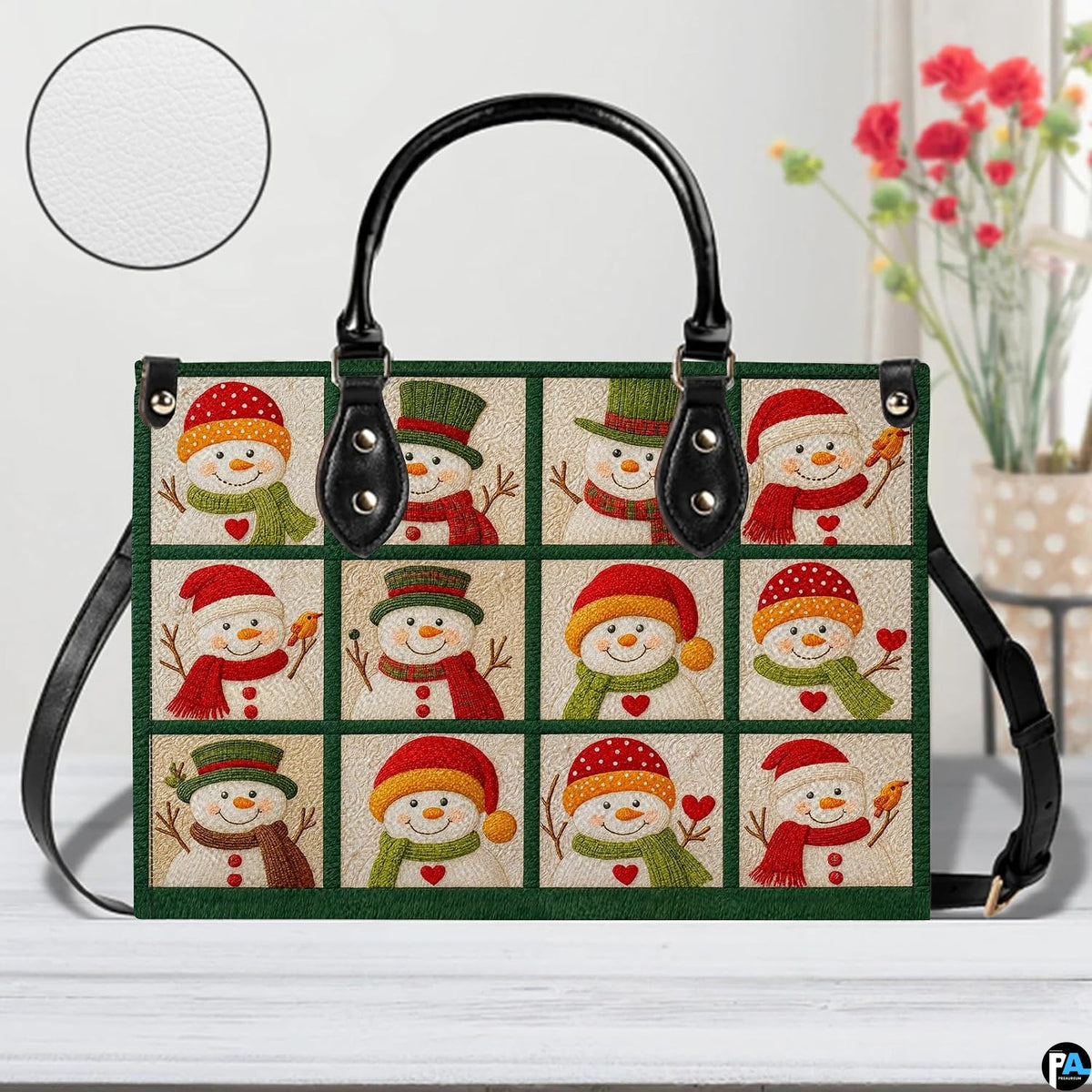 Front view of holiday snowman handbag standing next to a floral arrangement on a white tabletop.