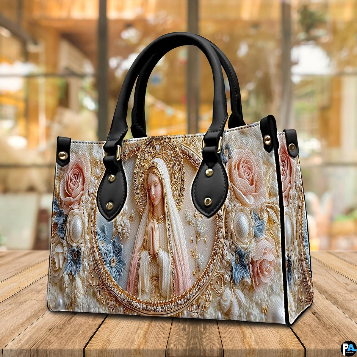 Lifestyle display showing handheld carry of the pearl cameo handbag in an outdoor setting.