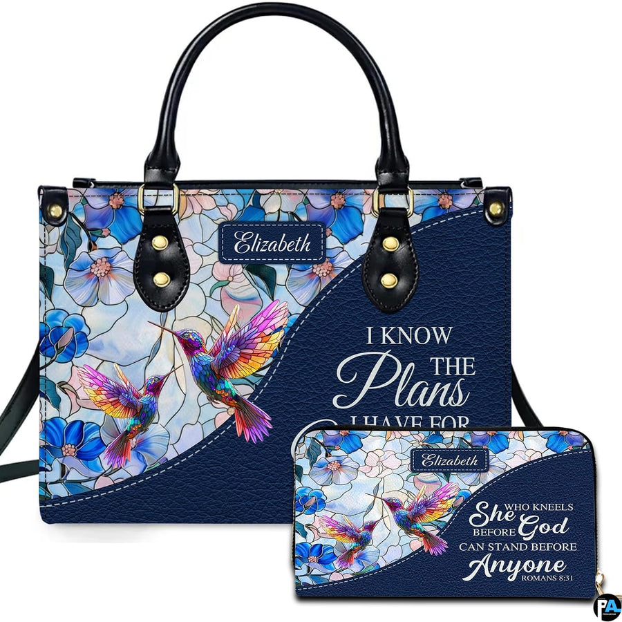 Stained glass floral mosaic with two colorful hummingbirds in flight and navy calligraphy framing.