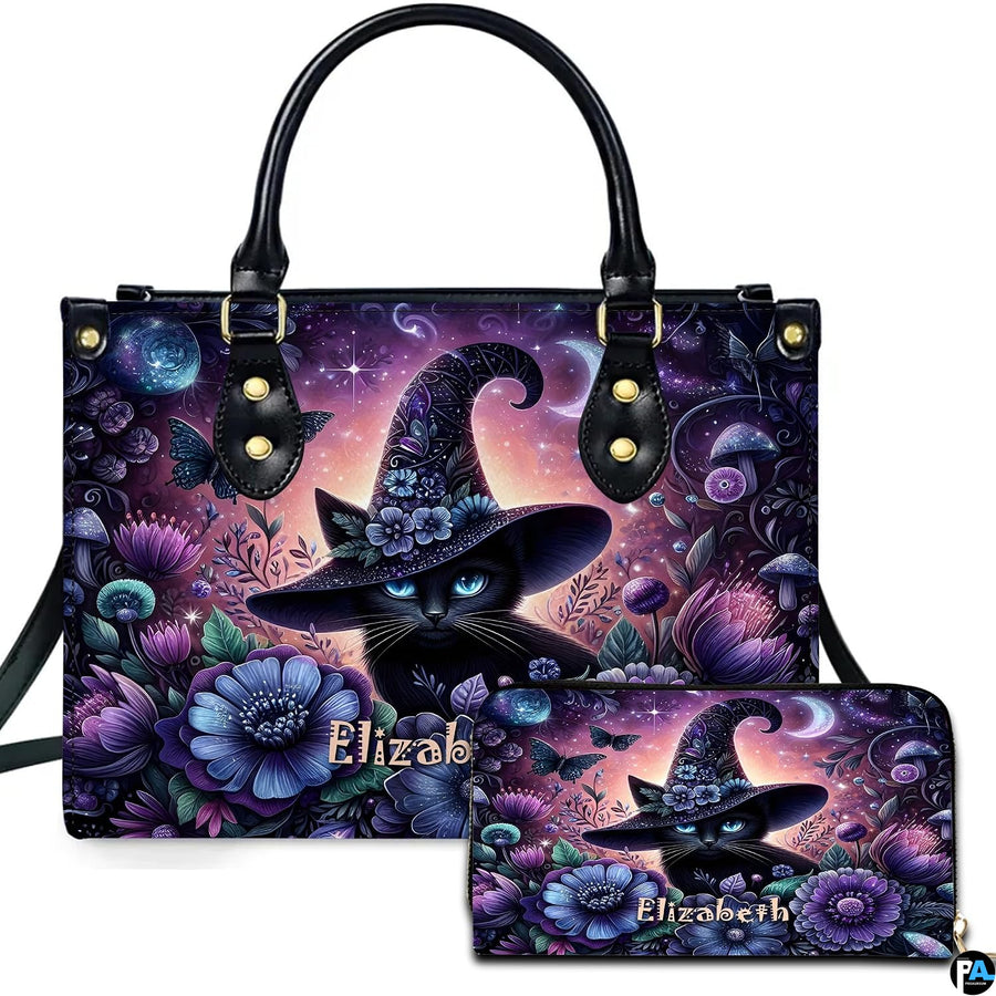 Studio presentation showing floral witch cat artwork alongside matching companion accessory on white surface.