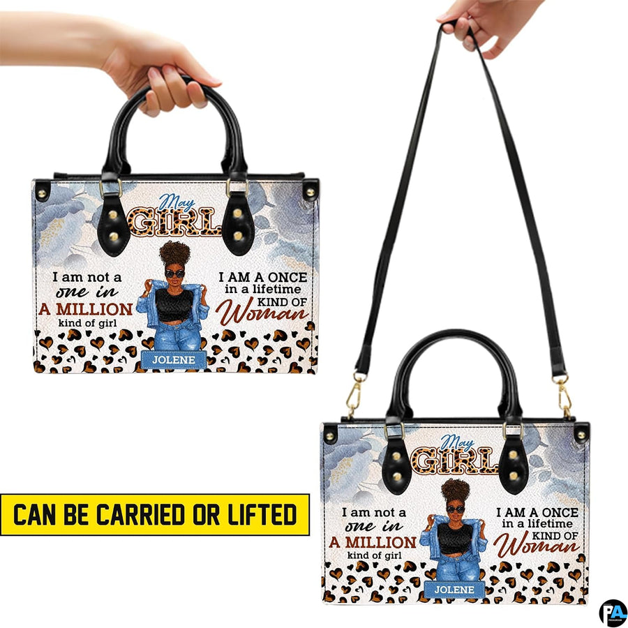 Visual demonstration displaying handheld and shoulder suspension configurations of afro puff art accessory.