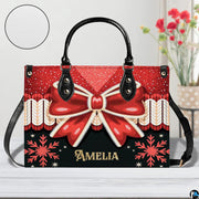 Measurement chart displaying dimensional specifications for holiday bow handbag.