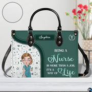 Angled perspective showing green nurse artwork and medical doodle panel on handbag
