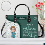Angled perspective showing green nurse artwork and medical doodle panel on handbag