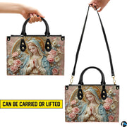 Interior view of porcelain Madonna handbag showing interior lining and compartment layout