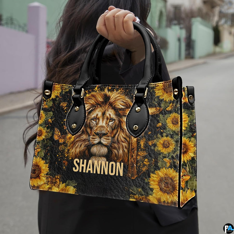 Lion sunflower cross handbag paired with matching wallet in spiritual wildlife theme.
