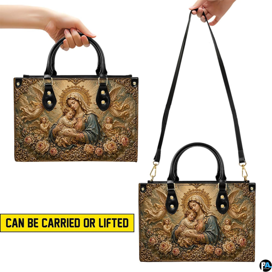 Celestial Virgin Mary handbag presented on natural wooden tabletop