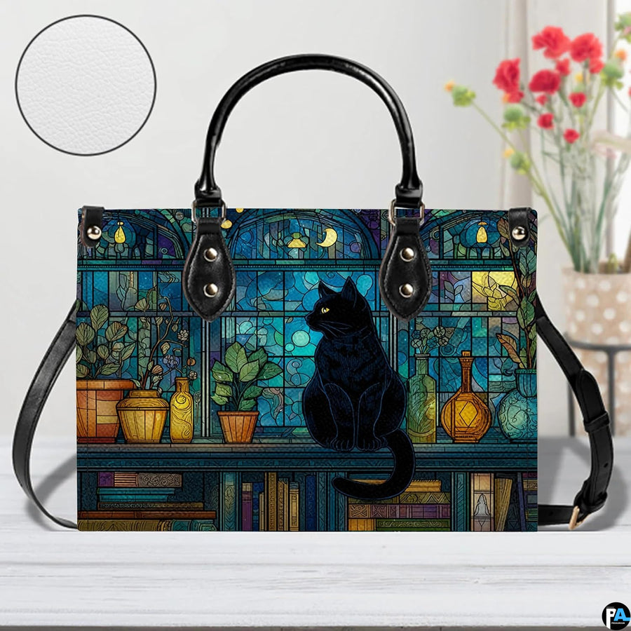Direct studio view of cat on crescent moon stained glass illustration showing circular surface inset.