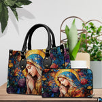 Stained glass rose Mary handbag and matching wallet shown with tabletop potted plant