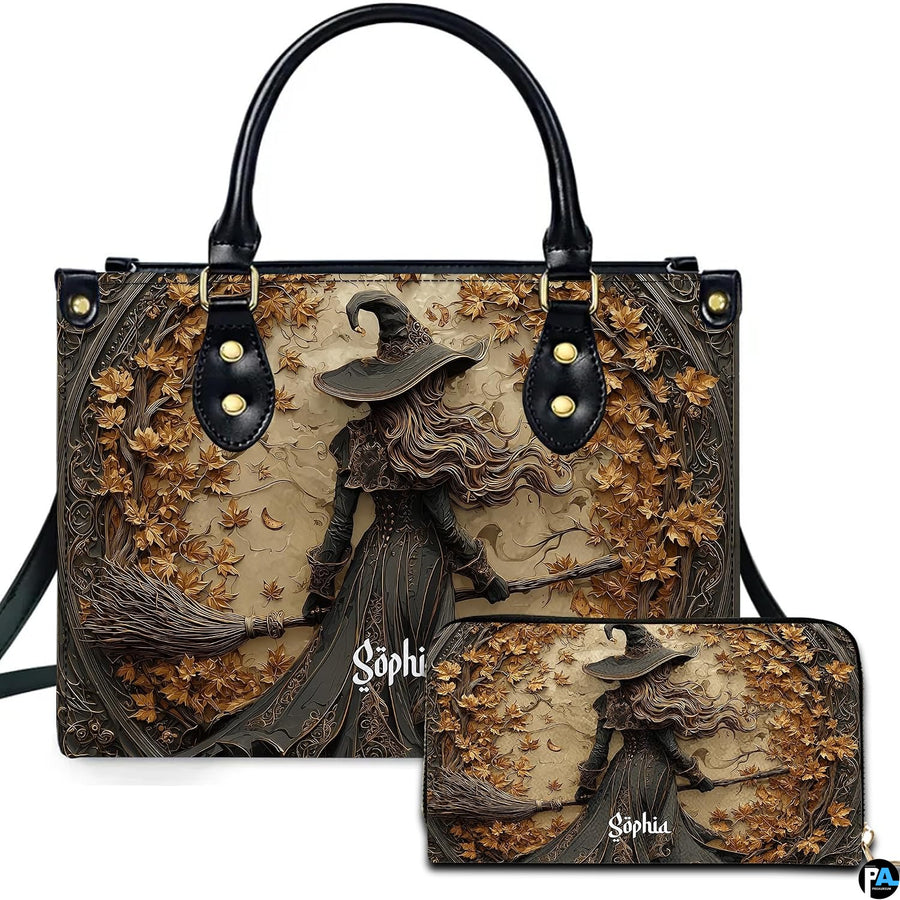 Gothic autumn witch broomstick handbag and matching wallet set displayed upright on white background.