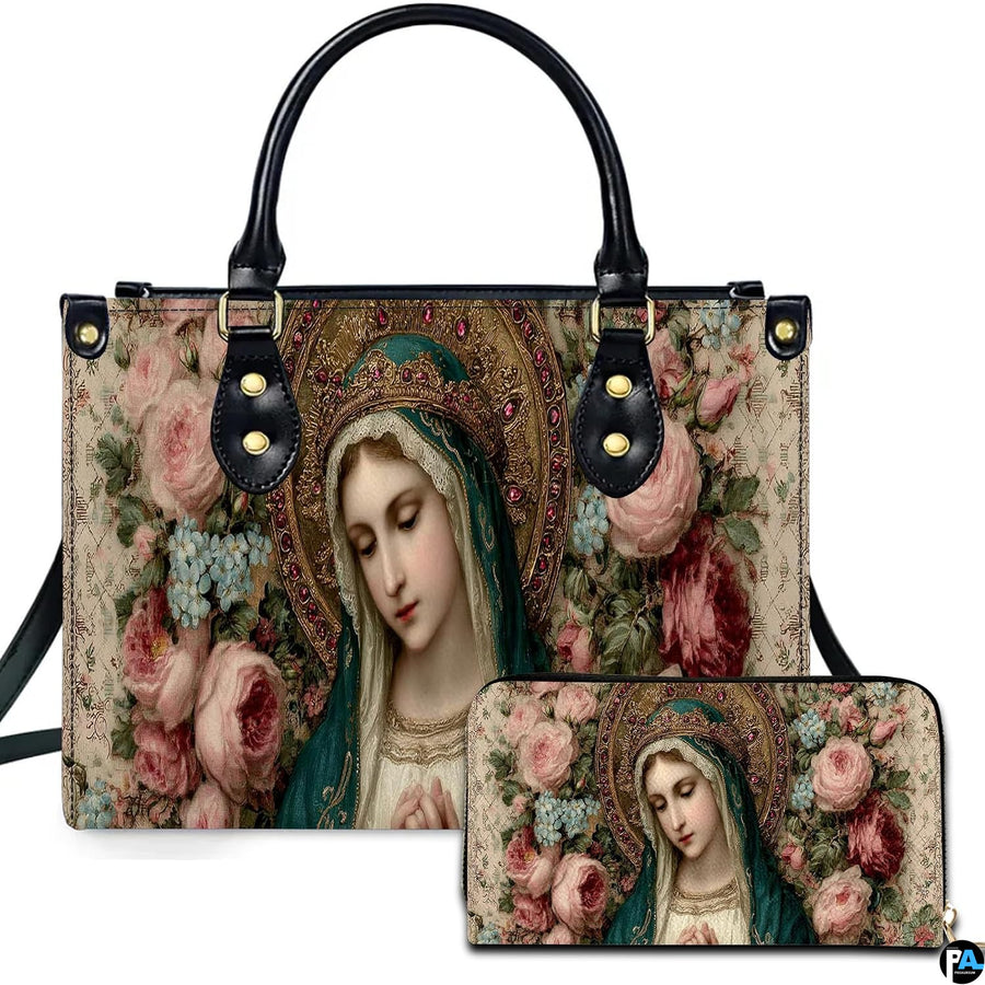 Front view of religious handbag featuring praying Virgin Mary portrait with jeweled halo and pink roses
