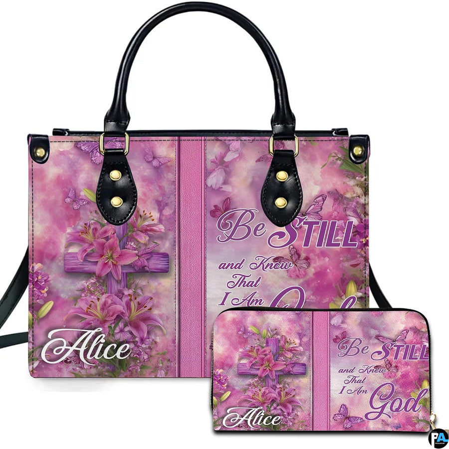 Pink lily cross handbag and matching zip wallet shown against studio background with floral artwork.