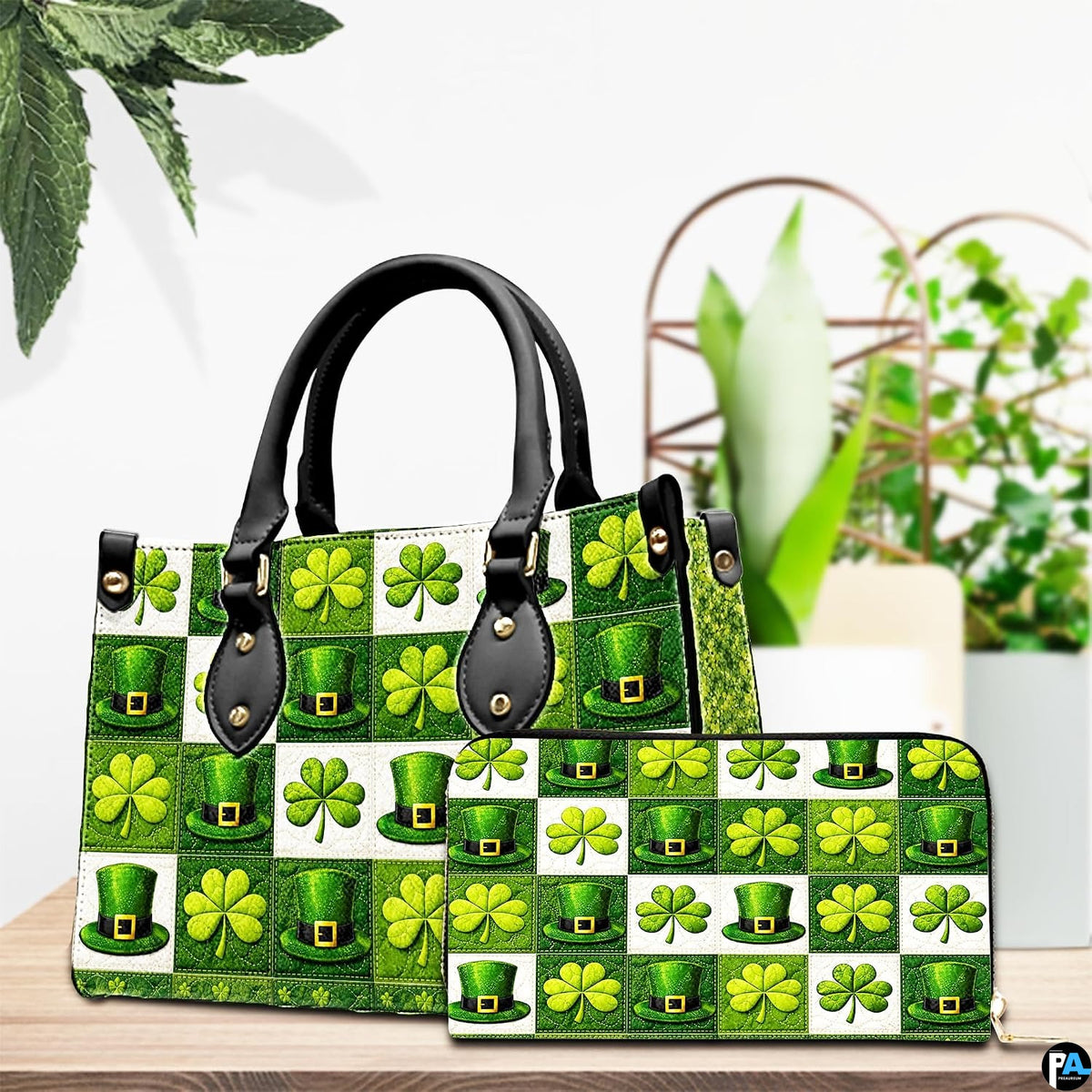 Green clover top hat handbag with coordinated wallet on a tabletop