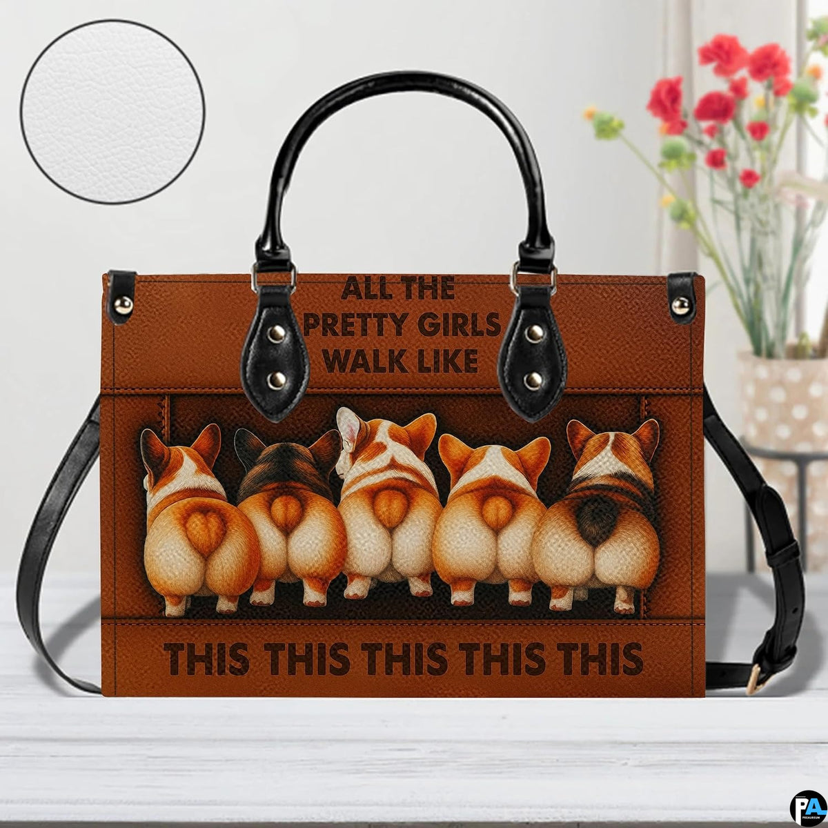 Tabletop frontal display of brown corgi accessory featuring surface detail swatch inset.