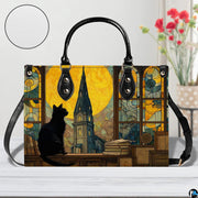 Close studio perspective of stained glass cat painting positioned on white surface beside flowers.