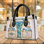Three quarter view of structured optometrist handbag showing side and front layout